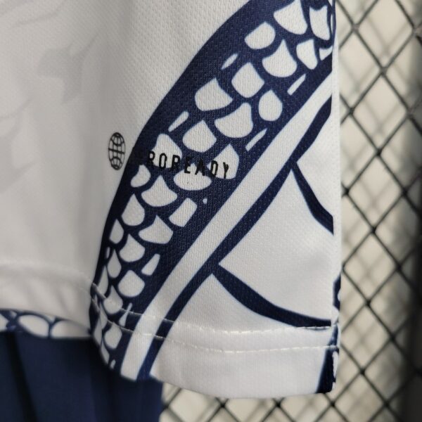 Real Madrid 2022/23 White Dragon Edition Kids Jersey And Shorts Kit - Image 4