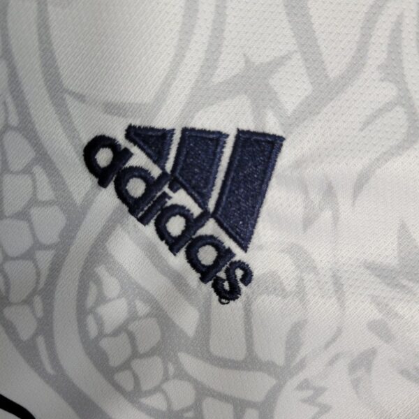 Real Madrid 2022/23 White Dragon Edition Kids Jersey And Shorts Kit - Image 10