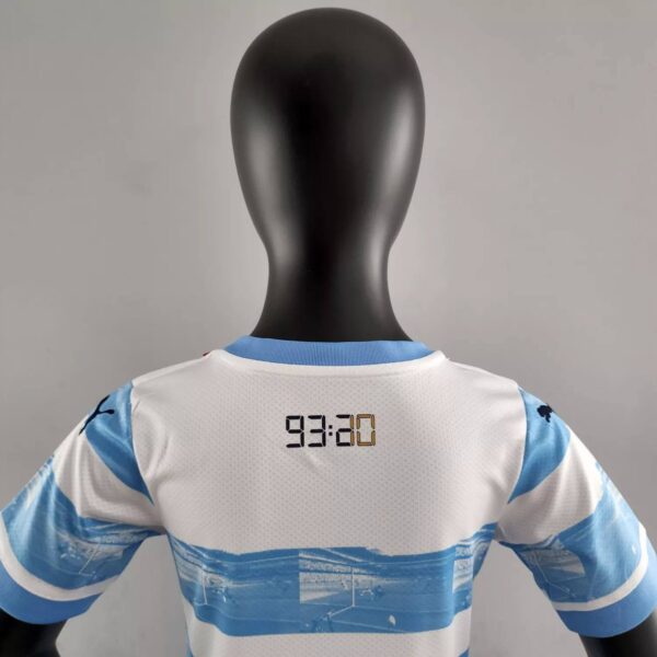 Manchester City 2022/23 Anniversary Kids Jersey And Shorts Kit - Image 7