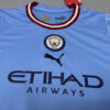 Manchester City 2022/23 Home Kids Jersey And Shorts Kit - Image 6