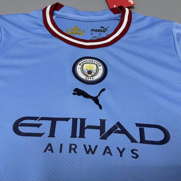 Manchester City 2022/23 Home Kids Jersey And Shorts Kit - Image 6